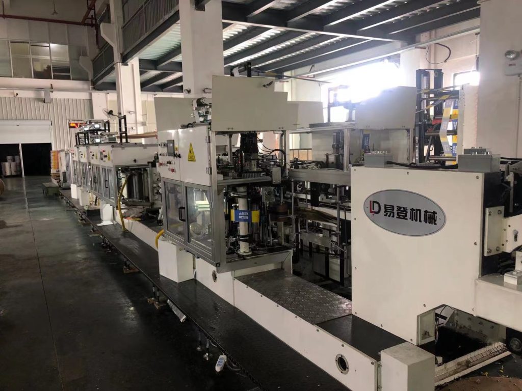 Valve paper bag bottomer machine